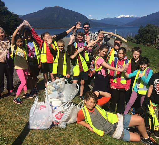 Students volunteering outdoors