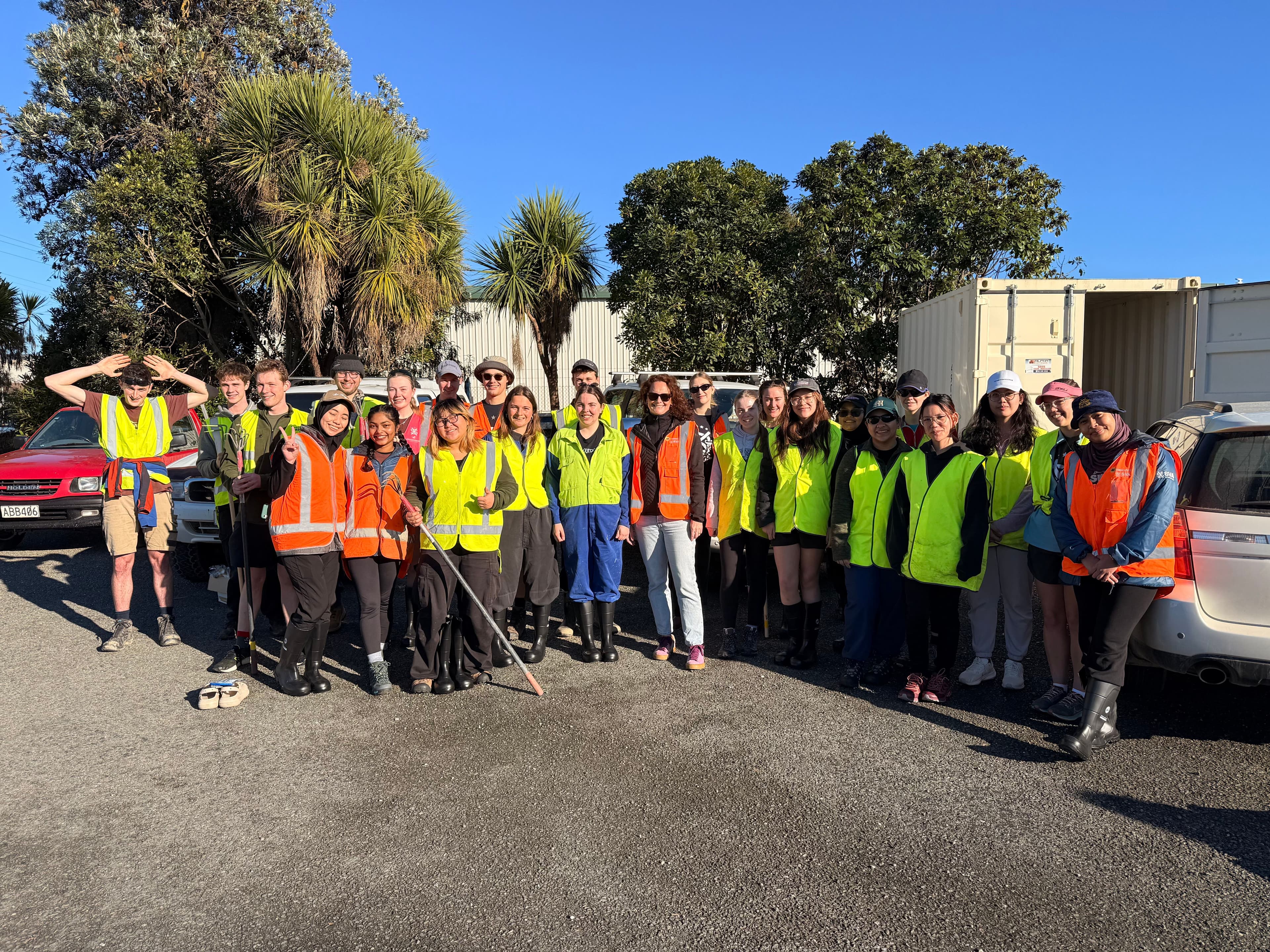 Students volunteering outdoors